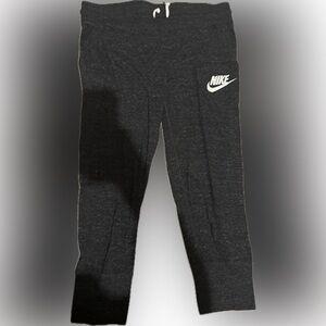 Women’s cropped Nike polyester sweats.